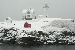 Maine's Nubble Lighthouse in Snowstorm